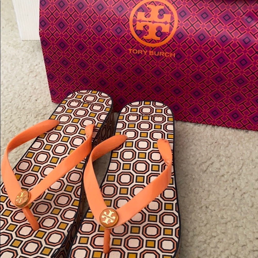 Tory Burch Flip-Flops (right has tiny mark on it)